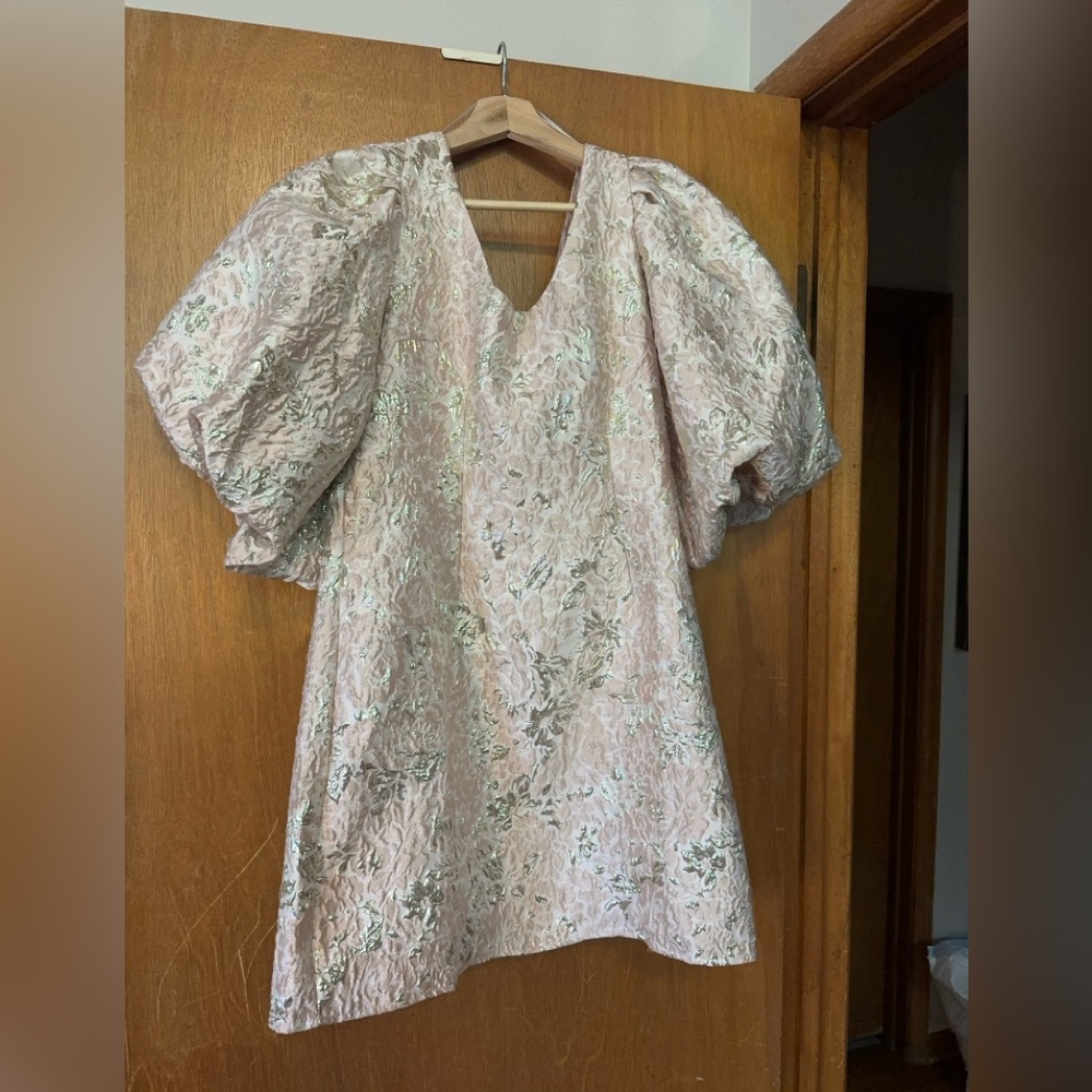 Sister Jane white mini dress with pink and gold details.